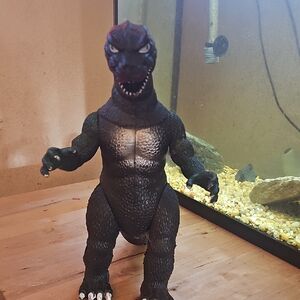 Black and Gray Reptile Habitat Dinosaur Figurine